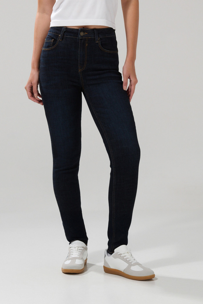 Jean azul intenso jegging tiro alto con cremallera en frente