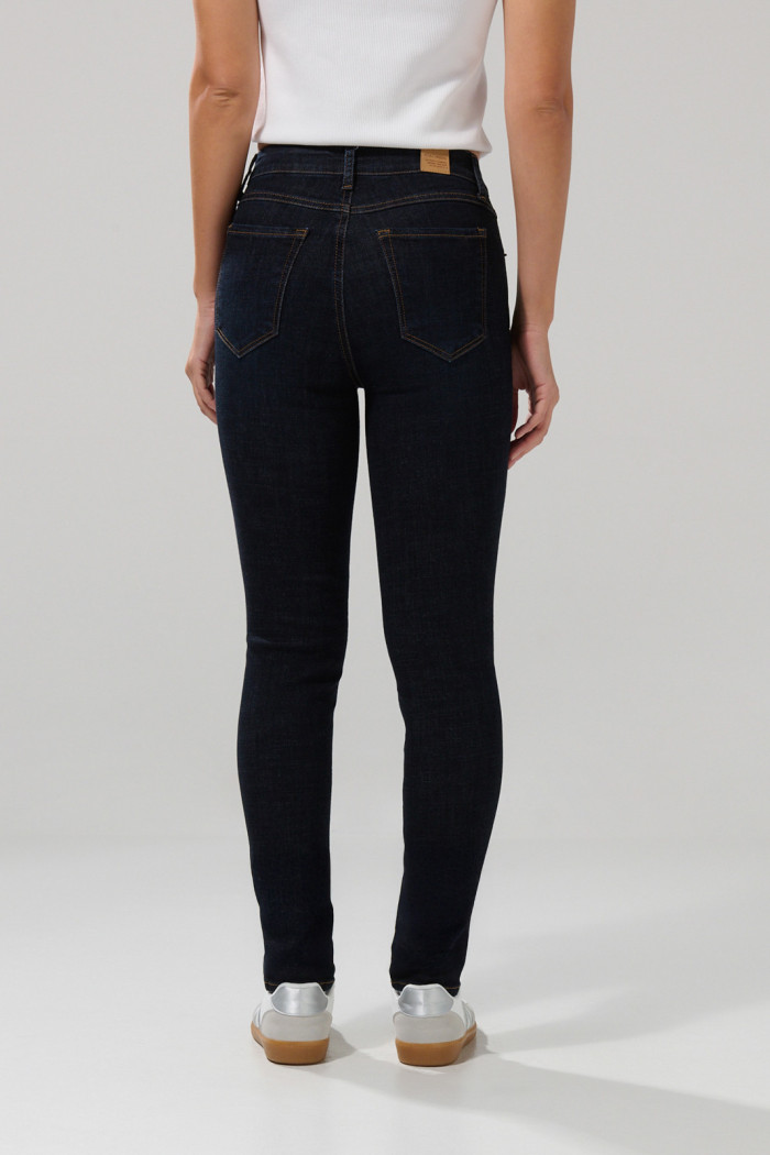 Jean azul intenso jegging tiro alto con cremallera en frente