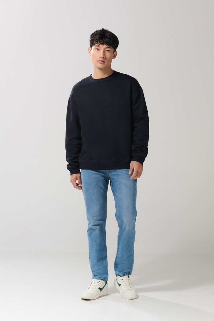 Buzo oversize perchado unicolor con cuello redondo