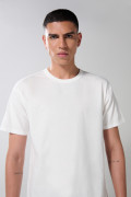 Camiseta hombro rodado unicolor en algodón manga corta