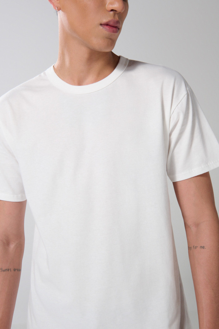 Camiseta hombro rodado unicolor en algodón manga corta