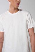 Camiseta hombro rodado unicolor en algodón manga corta