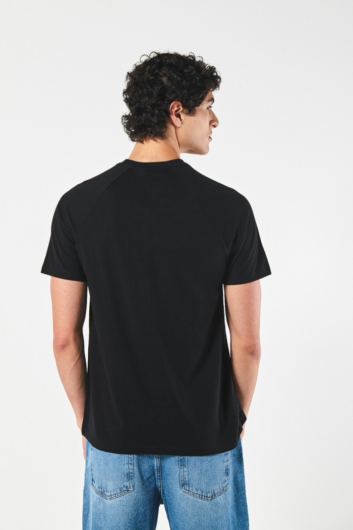 Camiseta manga ranglan corta unicolor en algodón