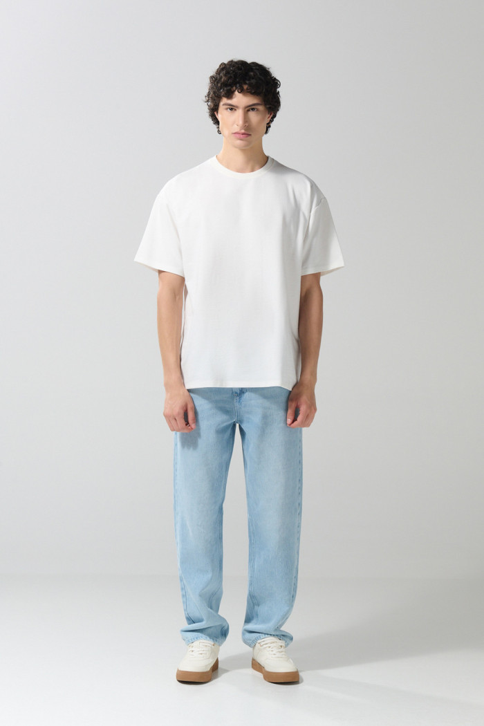 Camiseta unicolor oversize en tela pesada manga corta
