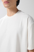 Camiseta unicolor oversize en tela pesada manga corta