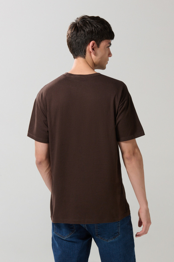 Camiseta en algodón manga corta unicolor con arte de paisaje
