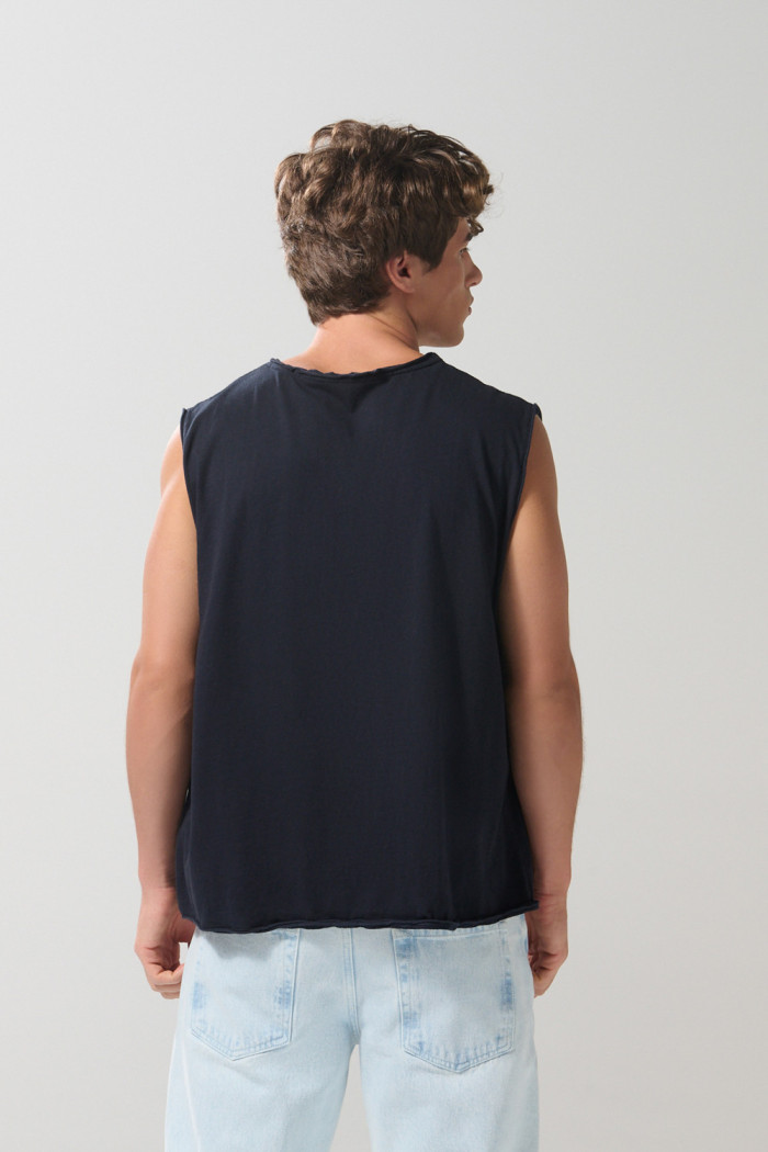 Camiseta manga sisa unicolor oversize en algodón