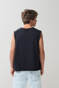 Camiseta manga sisa unicolor oversize en algodón