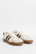 Tenis deportivos de plataforma blancos con contrastes