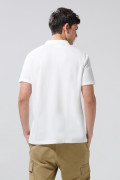 Camiseta manga corta polo unicolor con cuello nerú