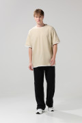Camiseta manga corta oversize unicolor con contrastes