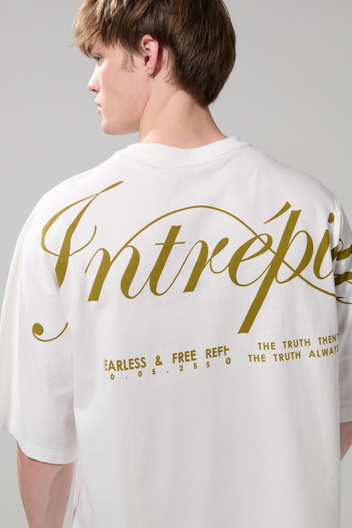 Camiseta unicolor oversize manga corta con textos