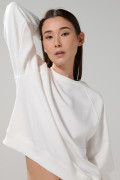 Buzo oversize cuello redondo unicolor con manga ranglan
