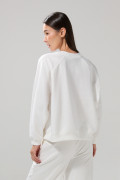 Buzo oversize cuello redondo unicolor con manga ranglan