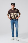 Jean tiro bajo skinny azul medio con ligeros desgastes