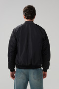 Chaqueta bomber acolchada unicolor con bolsillos laterales