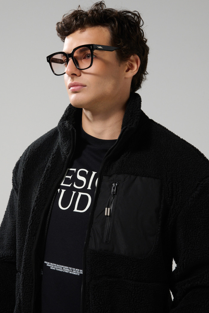 Chaqueta sherpa unicolor con bolsillos y cuello alto