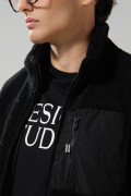 Chaqueta sherpa unicolor con bolsillos y cuello alto