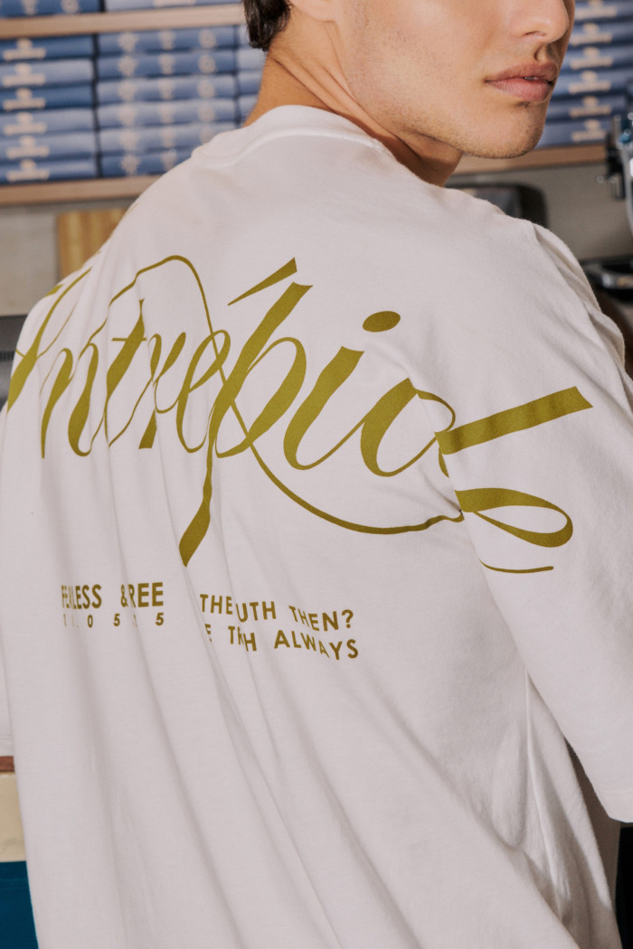 Camiseta unicolor oversize manga corta con textos