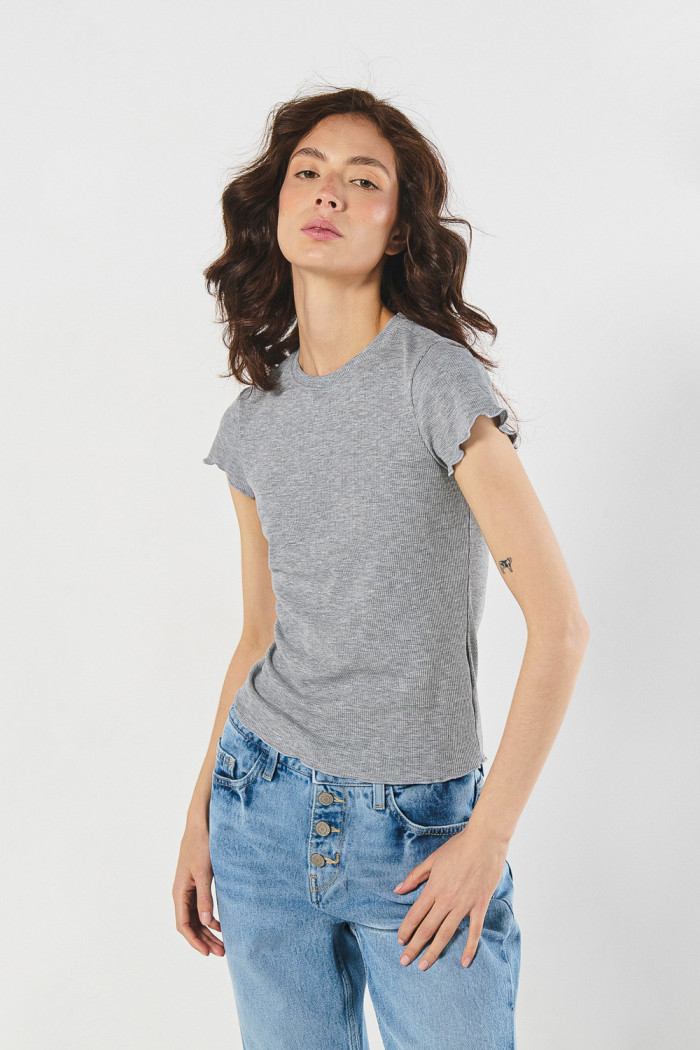 Camiseta unicolor manga corta con puños en mini filete