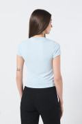 Camiseta unicolor en rib ajustada con cuello redondo