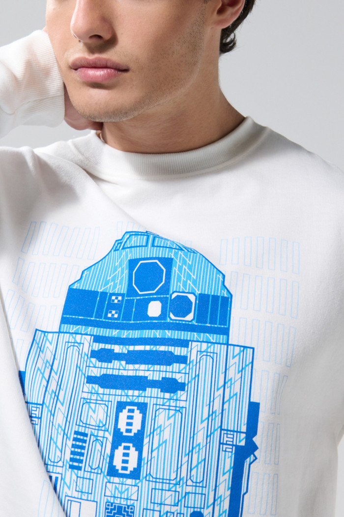 Buzo crema claro cuello redondo con arte de Star Wars