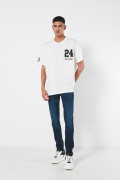 Camiseta crema oversize manga corta con diseños college