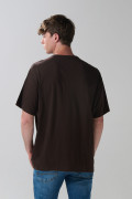 Camiseta unicolor oversize manga corta con arte college