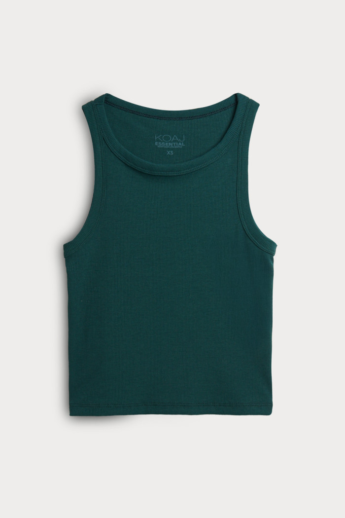 Camiseta unicolor cuello redondo con manga sisa y texturas