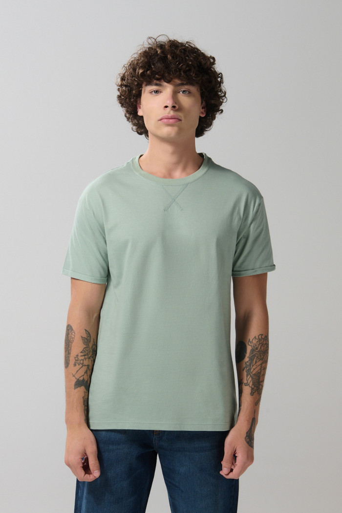 Camiseta en algodón unicolor con manga corta y costura