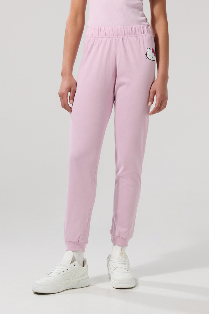 Pantalón jogger rosado claro con arte de Hello Kitty