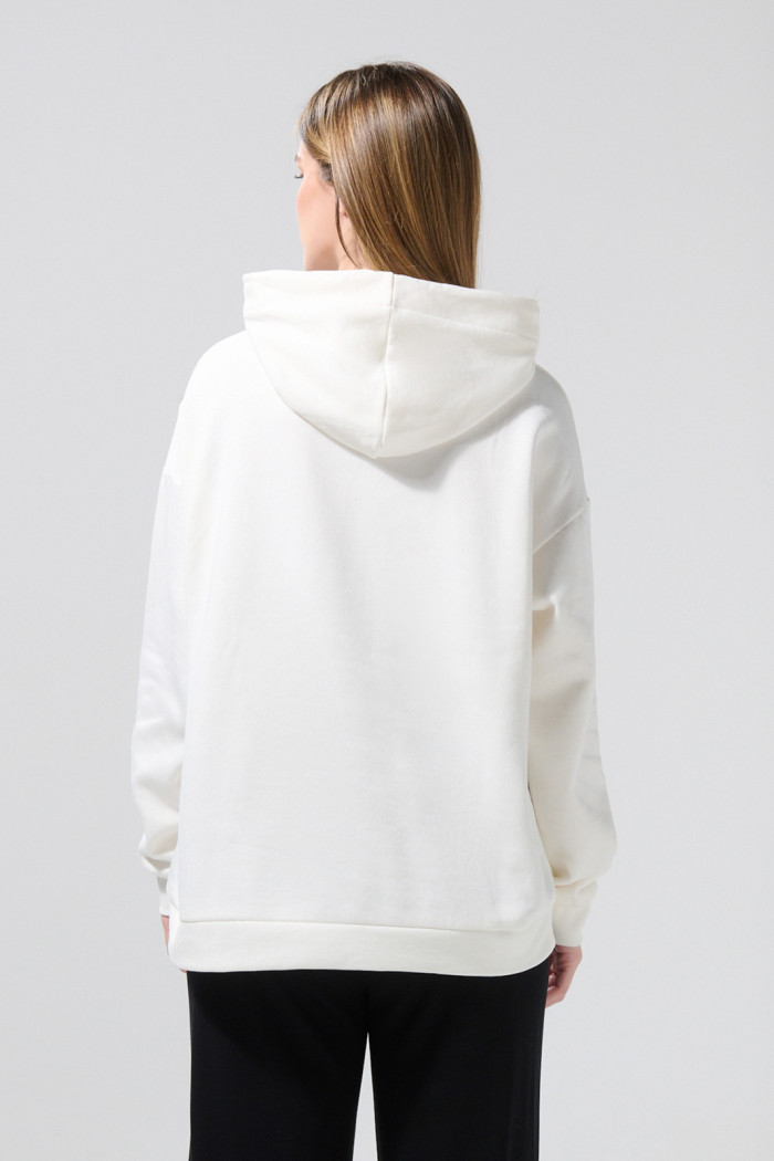 Buzo con capota crema oversize y diseño de Hello Kitty