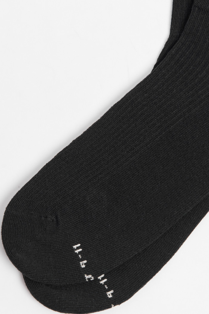 Medias unicolores largas con elástico y texturas