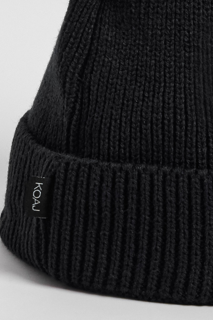 Gorro azul oscuro con diseño de Looney Tunes en frente