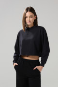 Buzo unicolor crop top cuello redondo con manga larga