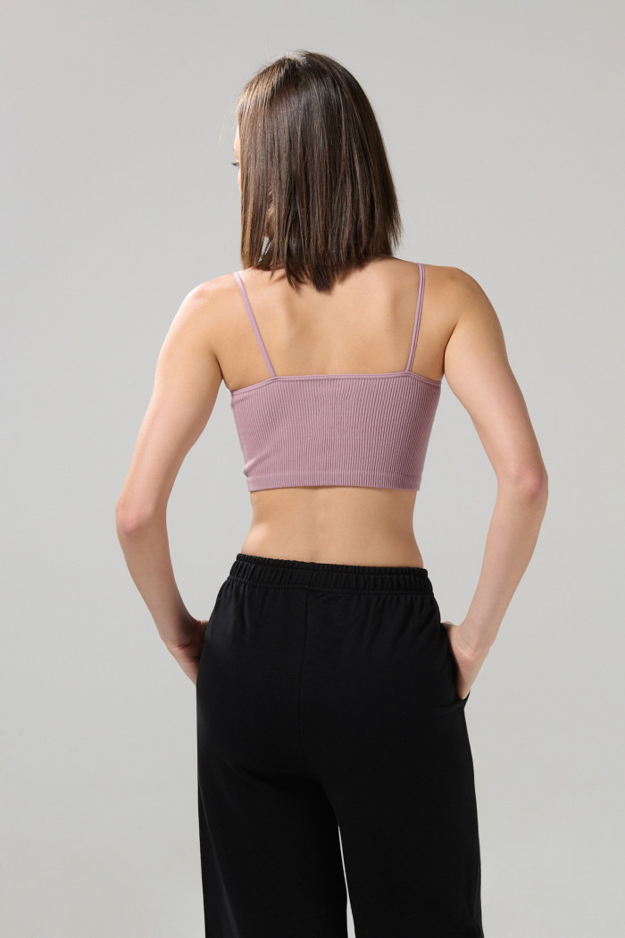 Camiseta unicolor crop top con escote V y manga sisa