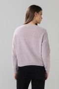 Suéter unicolor tejido cuello redondo con texturas