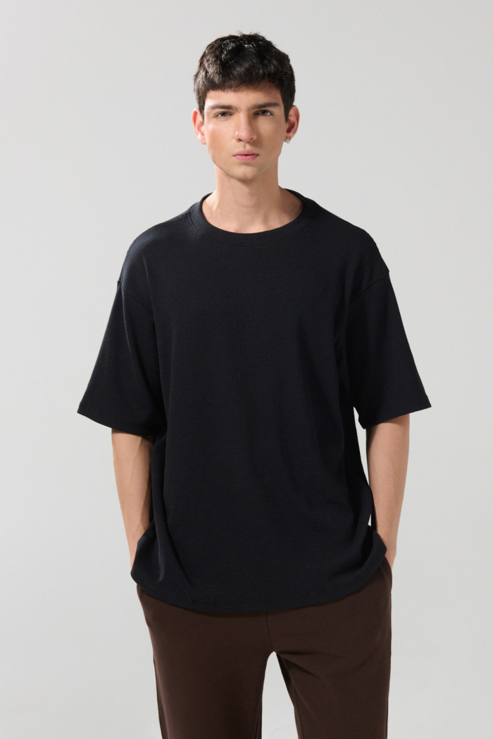 Camiseta unicolor manga corta con texturas oversize
