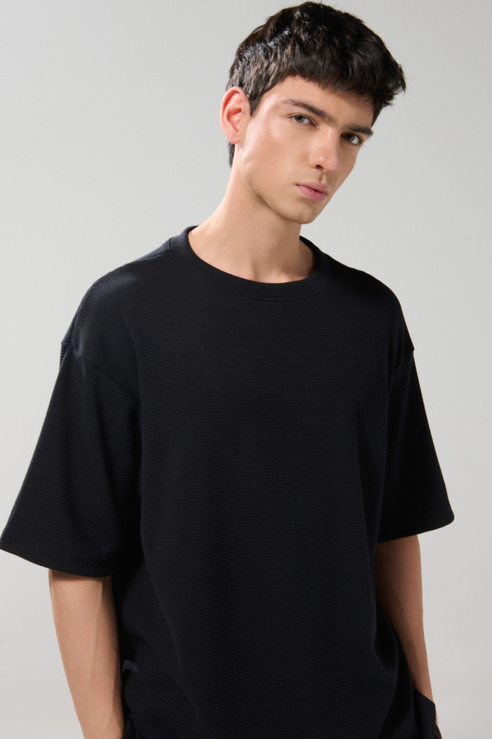 Camiseta unicolor manga corta con texturas oversize