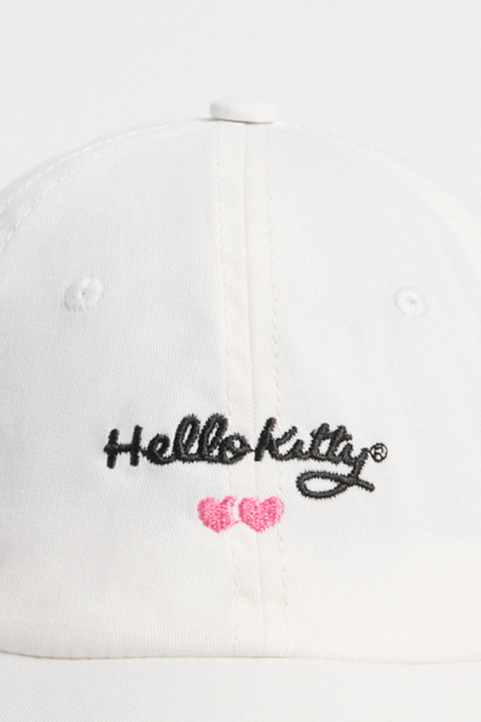 Cachucha crema clara beisbolera con diseño de Hello Kitty