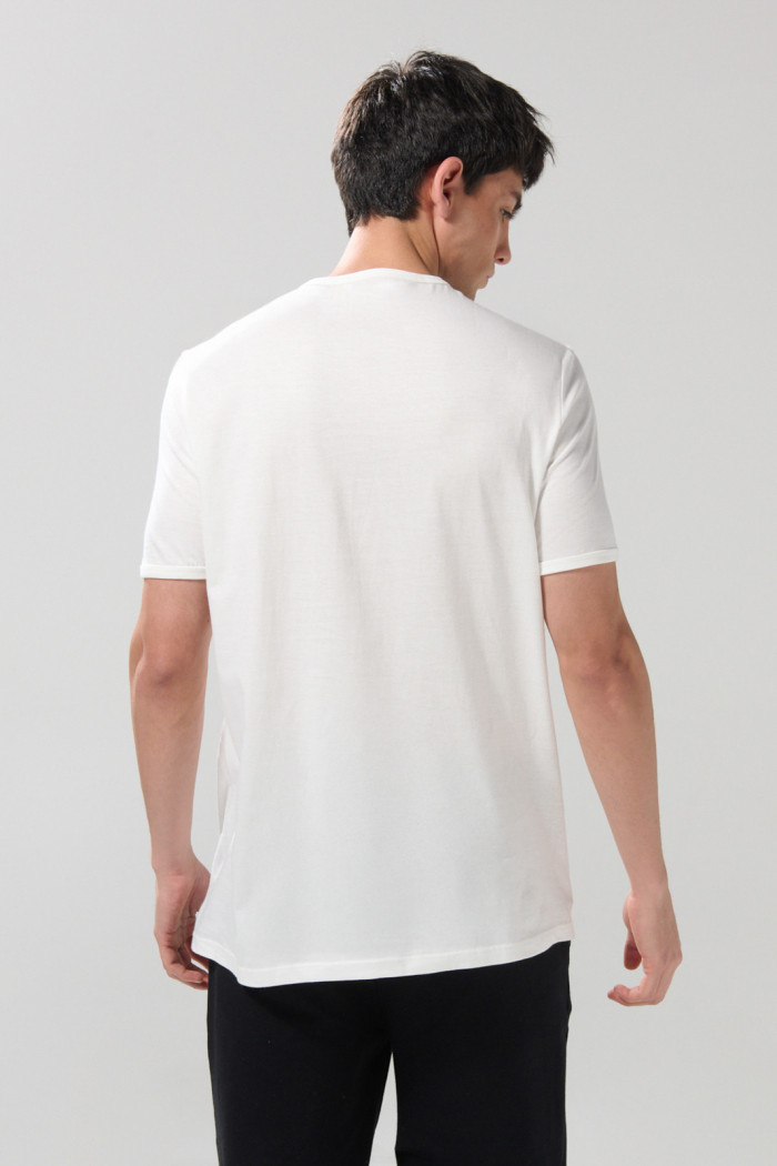 Camiseta con puños y cuello redondo en rib unicolor
