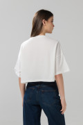 Camiseta crop top oversize crema con diseño de Mafalda