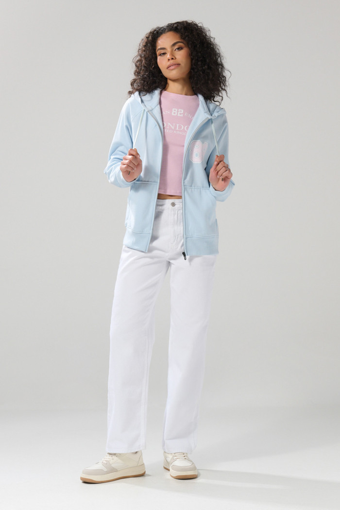 Buzo azul college oversize con cremallera y capota