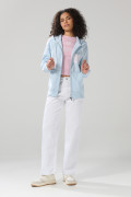 Buzo azul college oversize con cremallera y capota