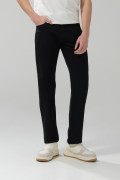 Jean slim negro con tiro bajo, 5 bolsillos y ajuste ceñido