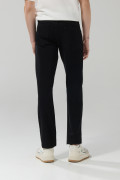 Jean slim negro con tiro bajo, 5 bolsillos y ajuste ceñido
