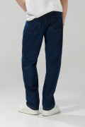 Jean azul oscuro baggy con bota ancha, bolsillos y tiro medio