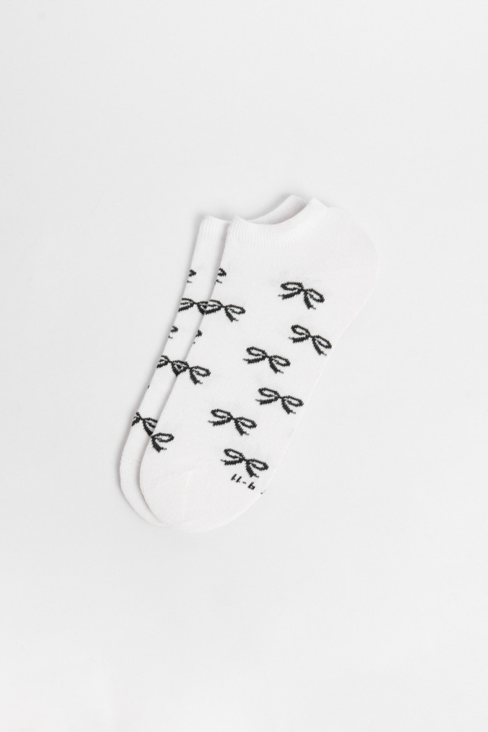 Medias unicolores tobilleras con diseño de moños