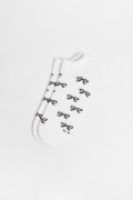 Medias unicolores tobilleras con diseño de moños