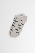 Medias unicolores tobilleras con diseño de moños